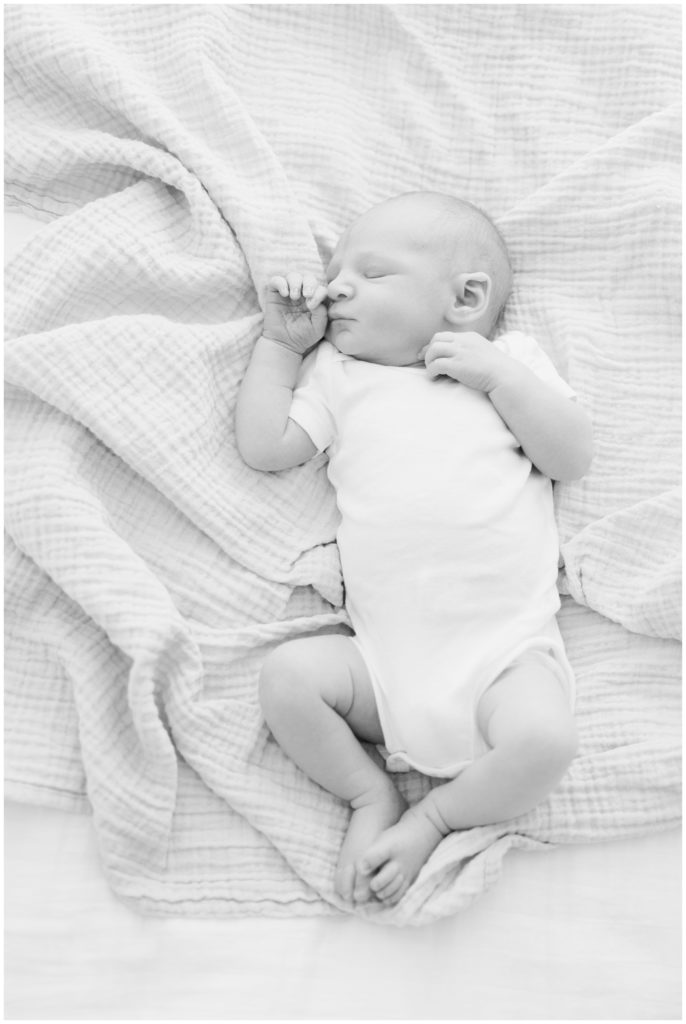 black and white image of a newbon baby

