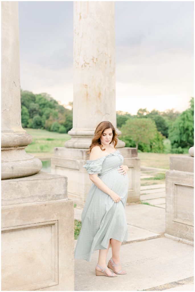 pregnant mother in a green dress