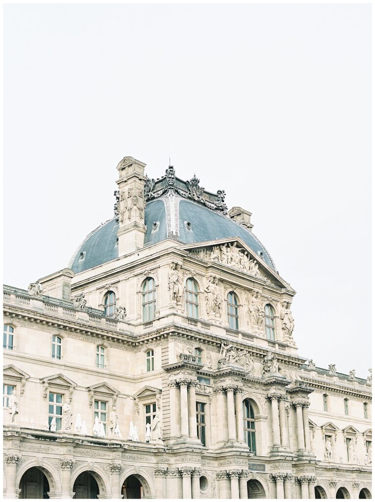 photograph featuring the architecture of the Louve that you can see during your babymoon in Paris
