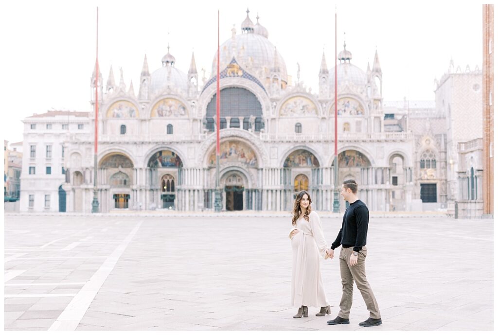 couple in Piazza San Marco during their Venice babymoon