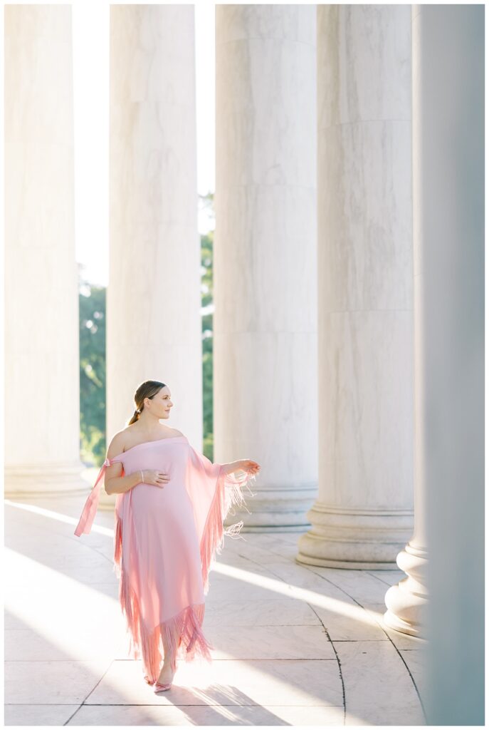 expectant woman wearing a pink gown
